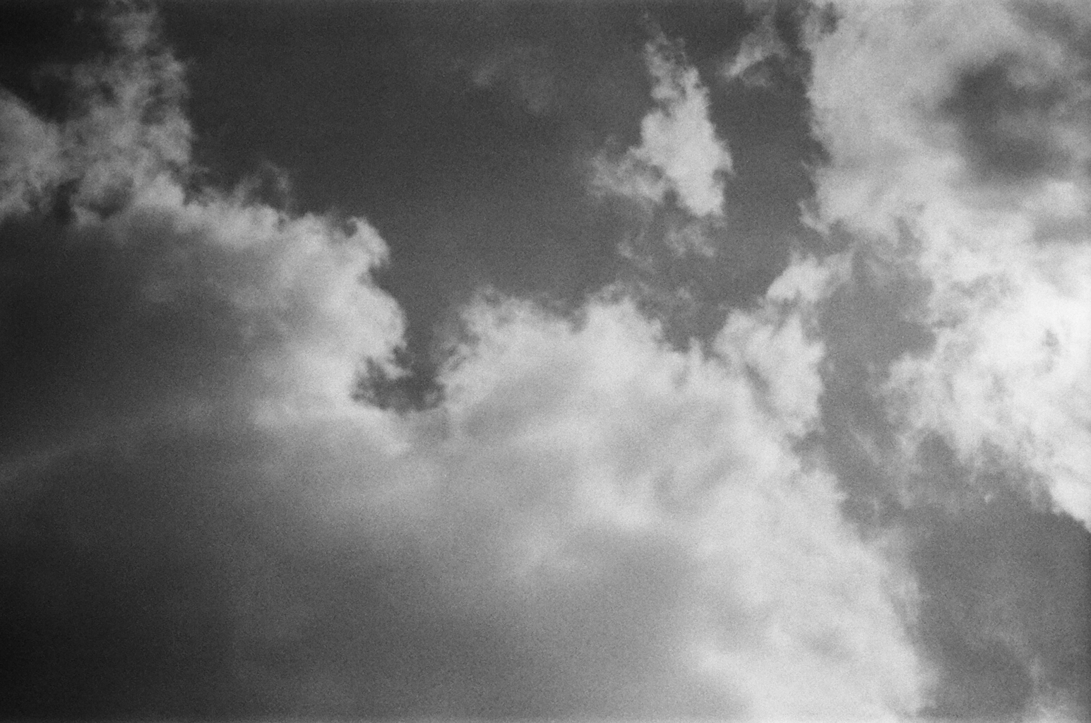 Film photograph — clouds